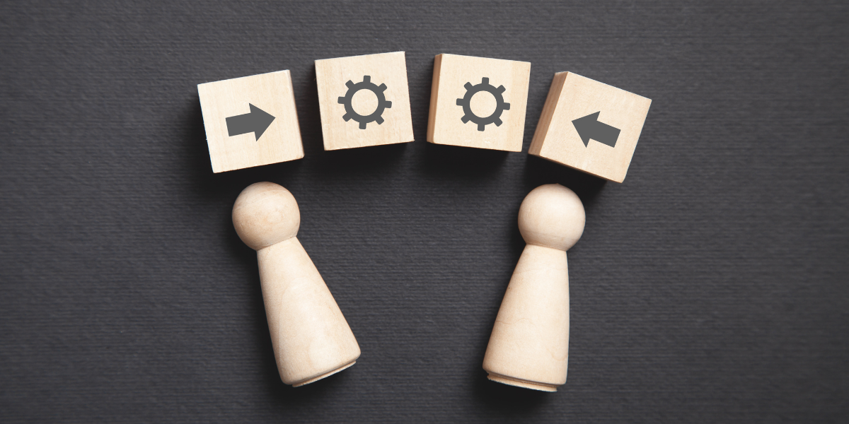 wooden blocks and characters to represent grant management knowledge transfer