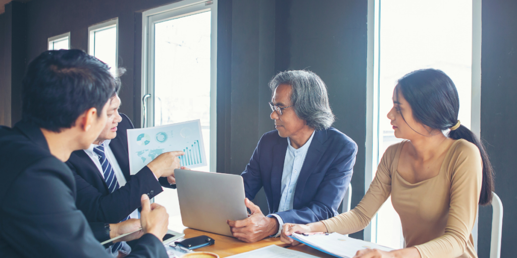 grant managers working in an office
