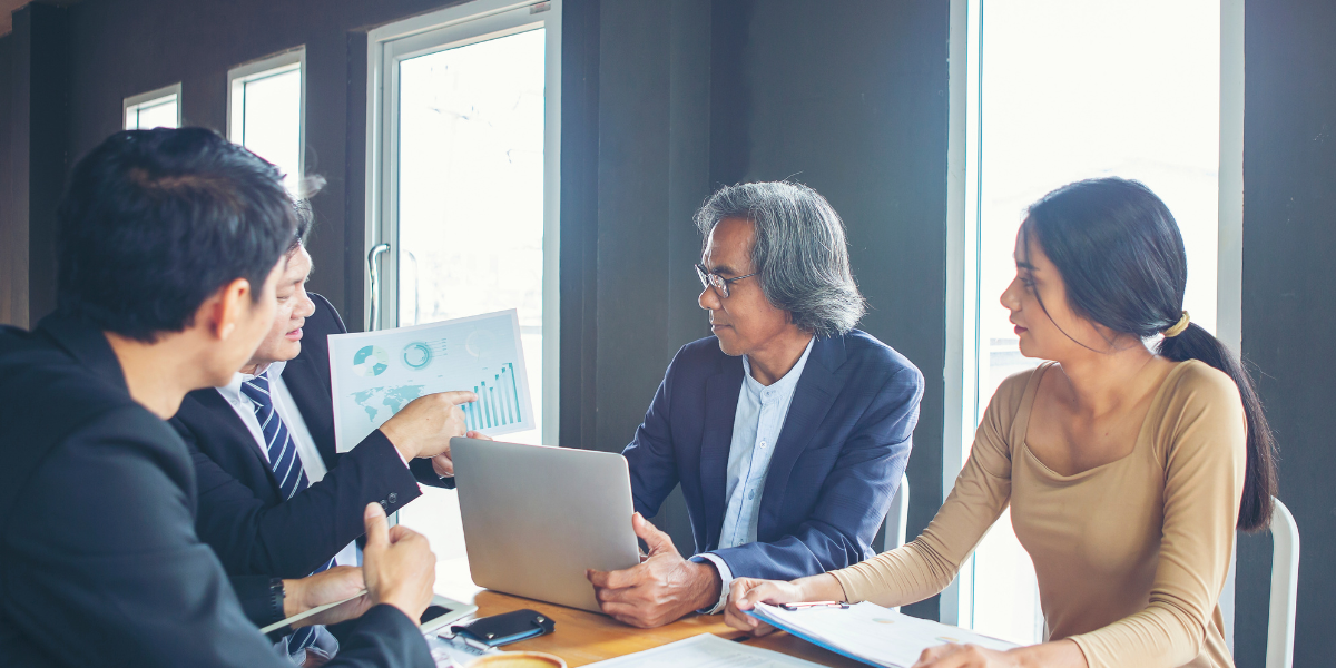 grant managers working in an office