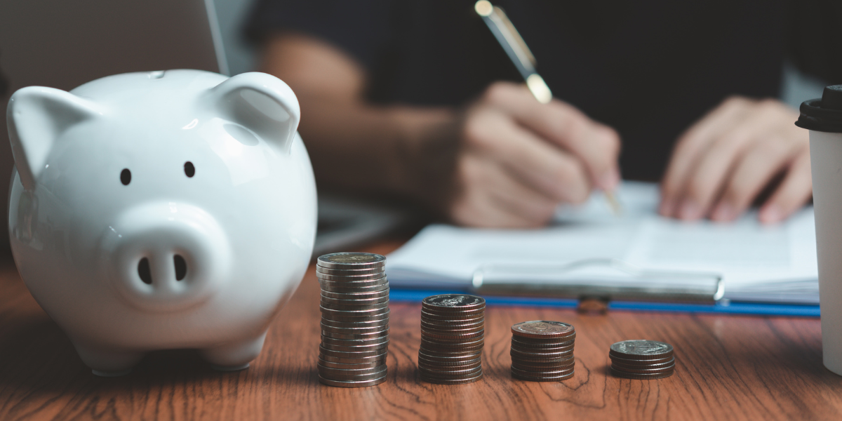 piggy bank and coins to represent the four types of federal grant funding
